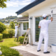 Painters in Birkenhead working on house exterior painting