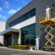 Professional commercial painters repainting the exterior of a commercial building in Auckland