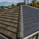 Visible roof restoration signs on an Auckland home including faded paint, weathering, and surface deterioration requiring professional roof restoration services.
