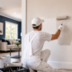 Professional painter from Premier Paint Works applying premium paint for a high-quality interior finish in an Auckland home.